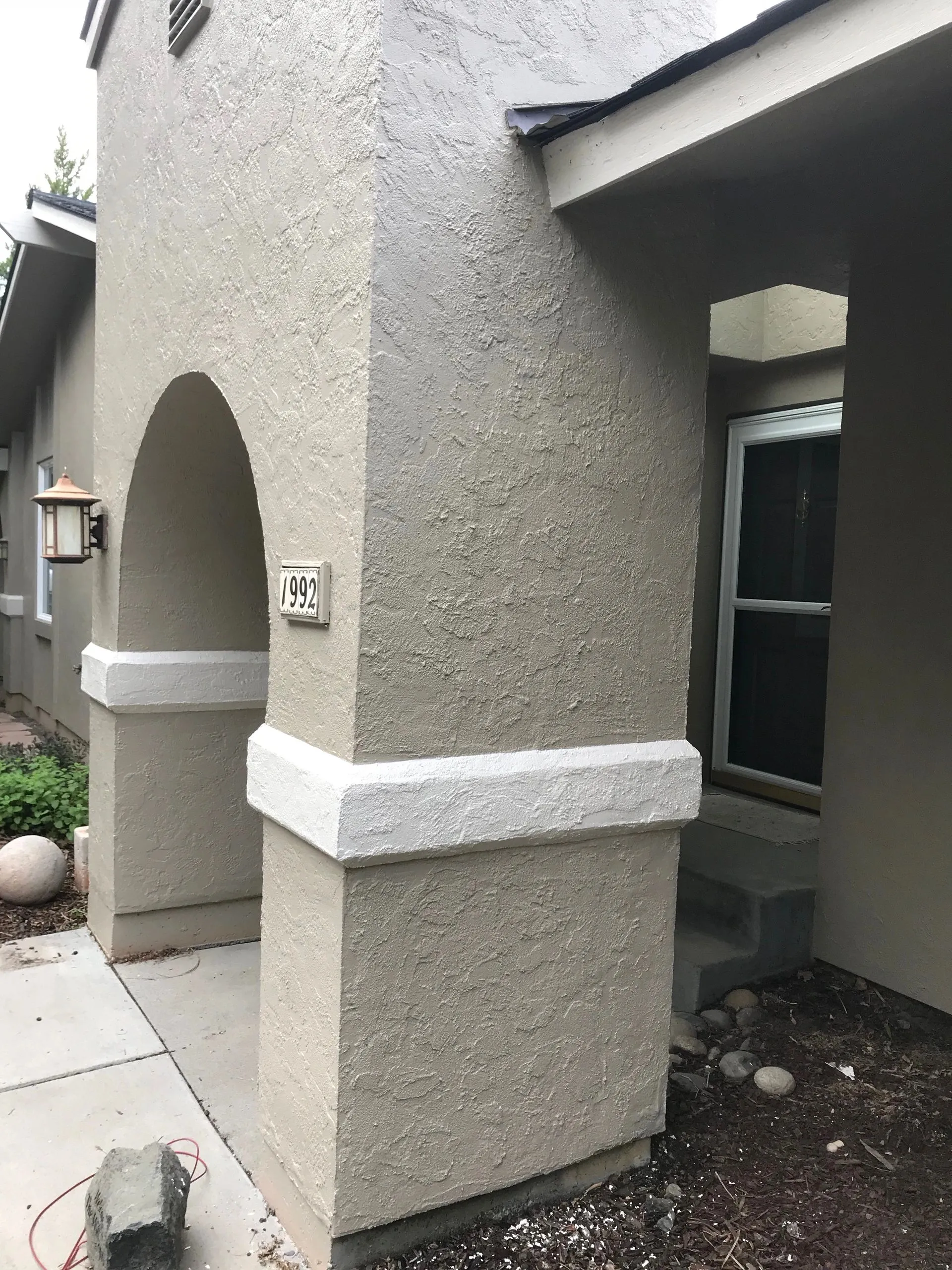 Stucco area prepared for repair